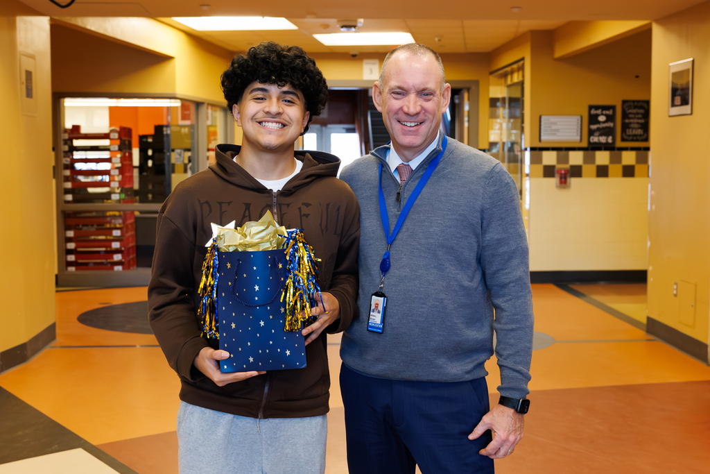 Superintendent Brian E. Allen with North High 11th grade student Ricardo Bonilla.