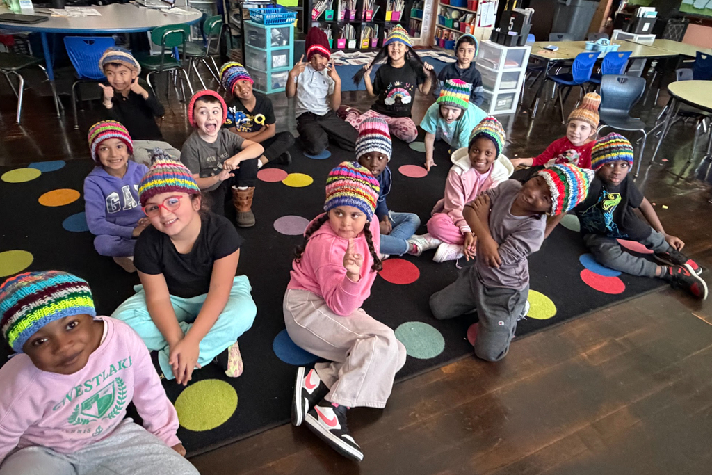 Students at Rice Square wear knitted winter hats.