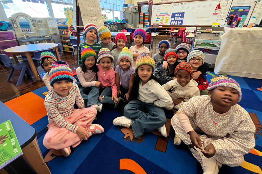 Students at Rice Square wear knitted winter hats.