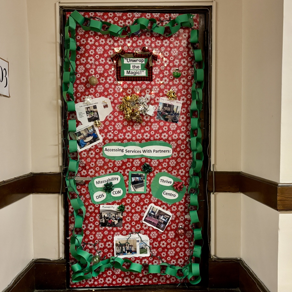 A door decorated with red snowflake wrapping paper, green paper chains, and fairy lights, featuring photos and text about "Accessing Services With Partners."