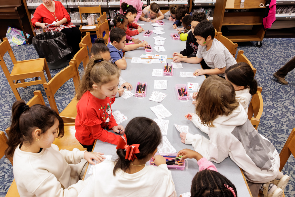 A group of students work on arts and crafts.