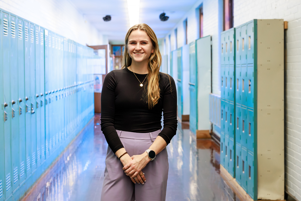 Colleen Cutting in the hallway of Worcester East Middle School.