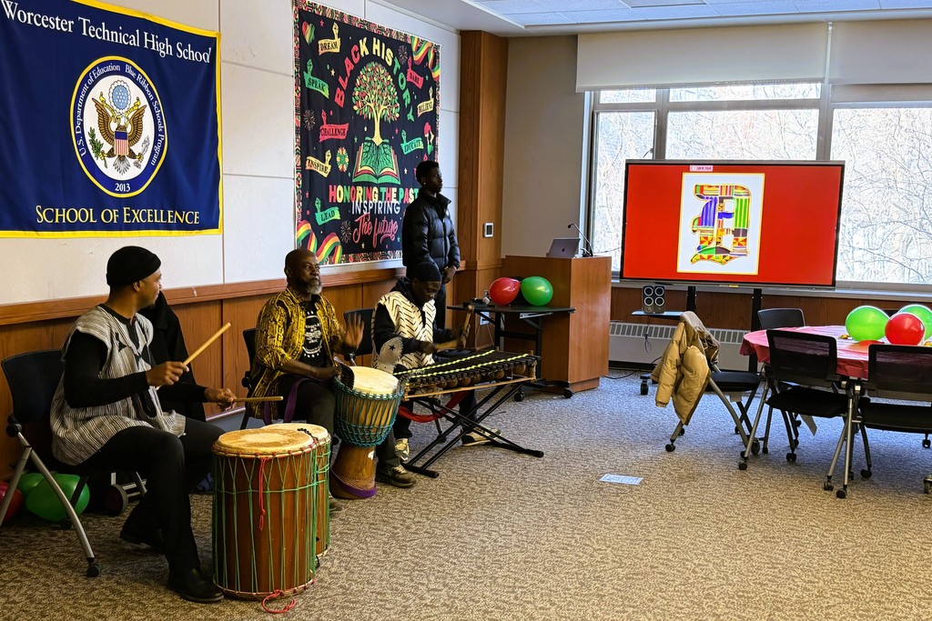 Musicians play drums and a xylophone during a Black History Month event at Worcester Technical High School.
