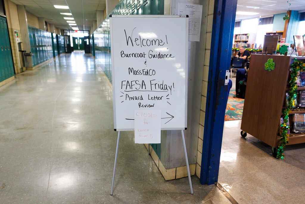 A sign that says "Welcome! Burncoat Guidance & MassEdCo FASFA Friday Award Letter Review"