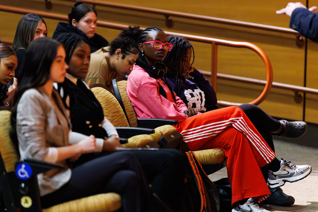 A student listens while Congressman Jim McGovern speaks.