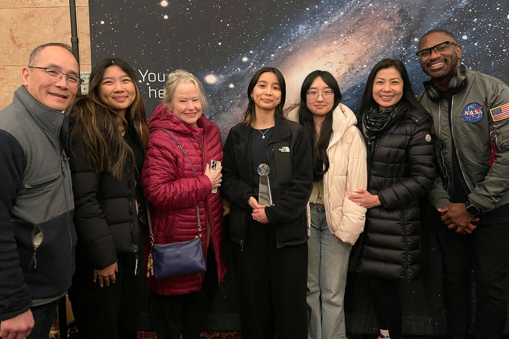 Kristen Doan stands with her family and supporters after being awarded the Esther Goddard Students Award.