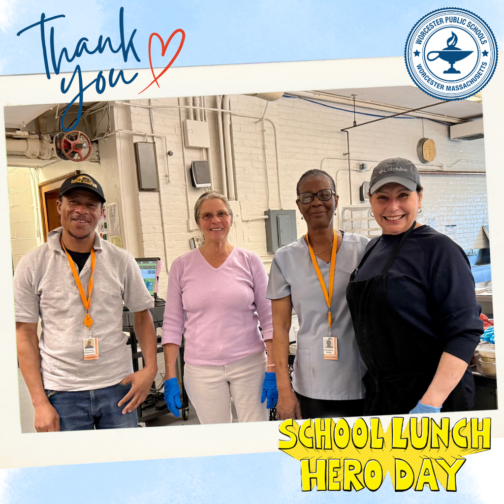 Four smiling individuals stand together, celebrating School Lunch Hero Day with a "Thank You" message.