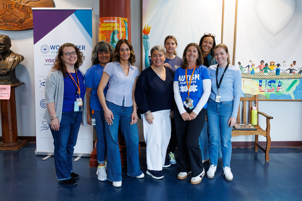 Front office staff of Roosevelt School stand together wearing blue to close out Autism Awareness Month.
