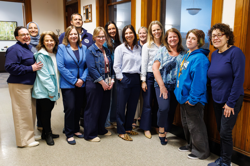 Administrative staff at the Durkin Administration Building wearing blue to close out Autism Awareness Day.