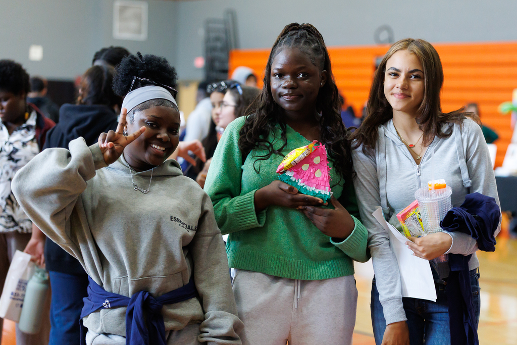 A group of students pose togetherafter winning a raffle.