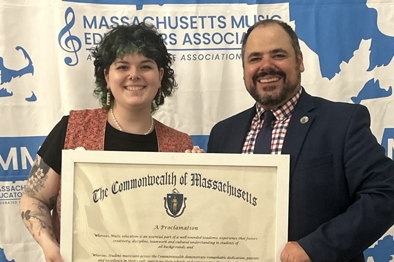 Jupiter Montalvo stands alongside colleagues during their first Massachusetts Music Educators Association conference.