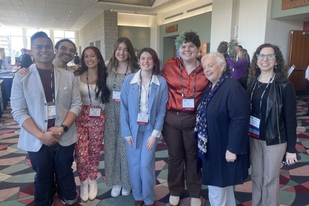 Jupiter Montalvo stands alongside colleagues during their first Massachusetts Music Educators Association conference.