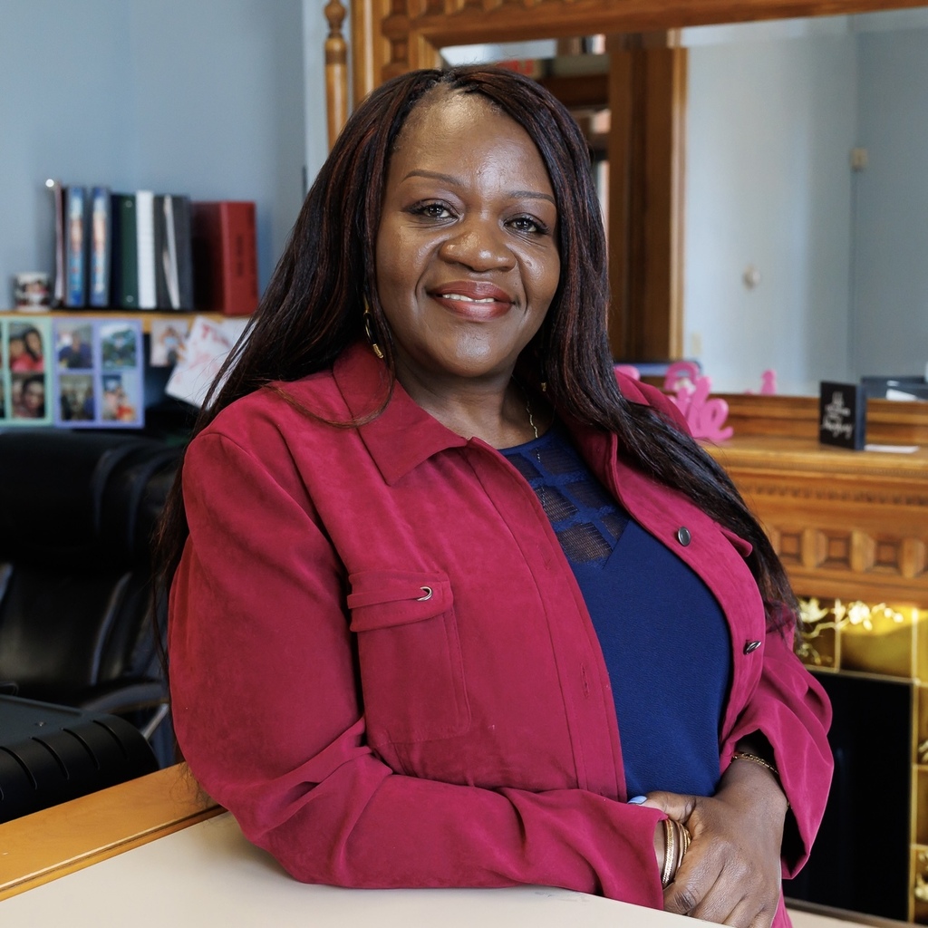 A headshot of Sue Obiero of the Parent Information Center.