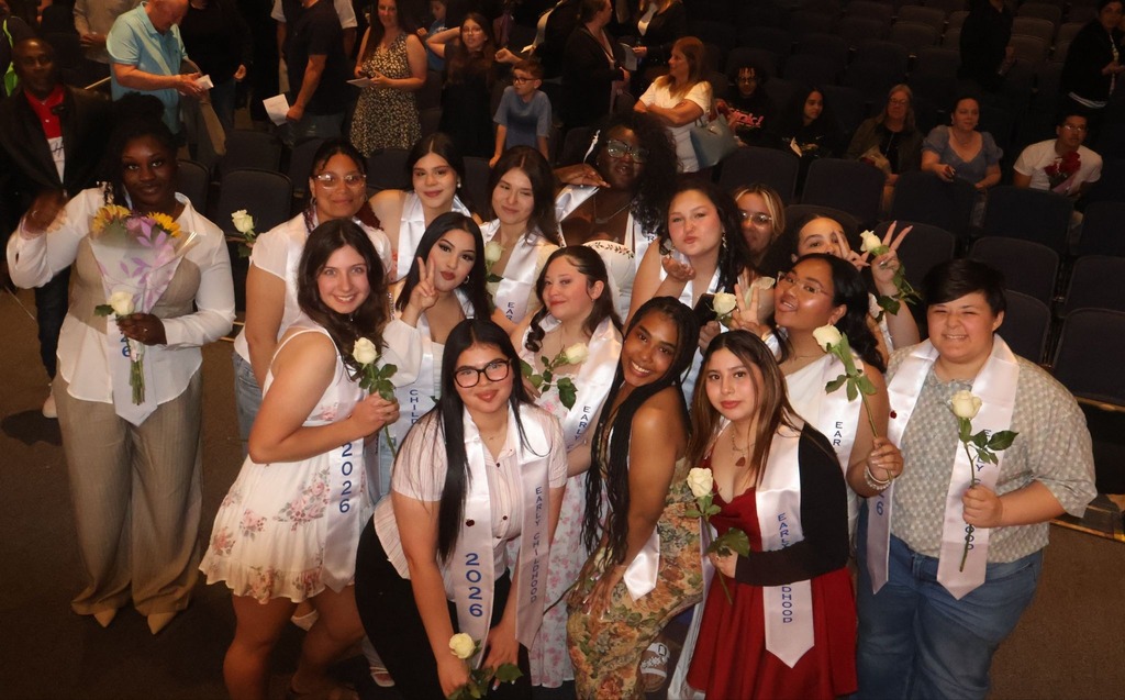 Early Childhood seniors after their pinning 
