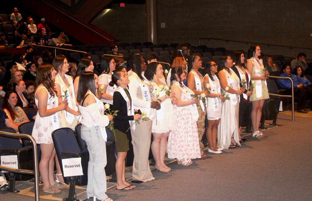 Early Childhood seniors after their pinning 