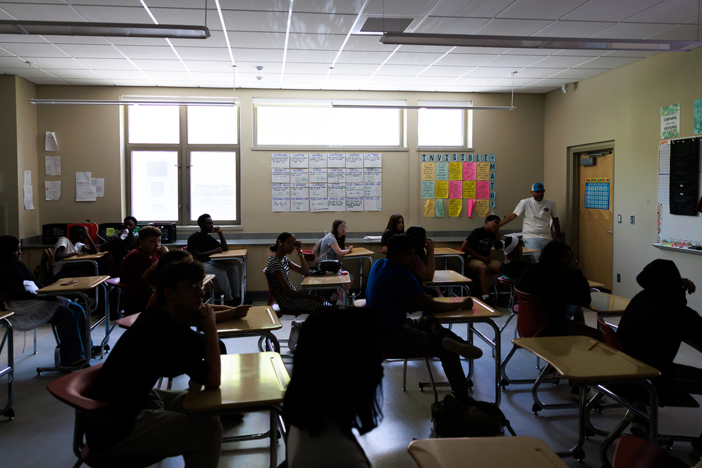 A room of students during an orientation event.