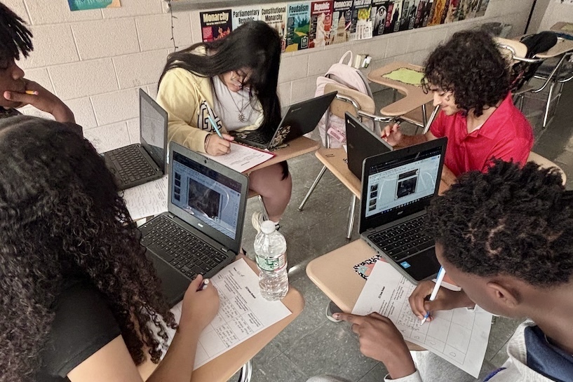 Students work on a lesson together about September 11, 2001.