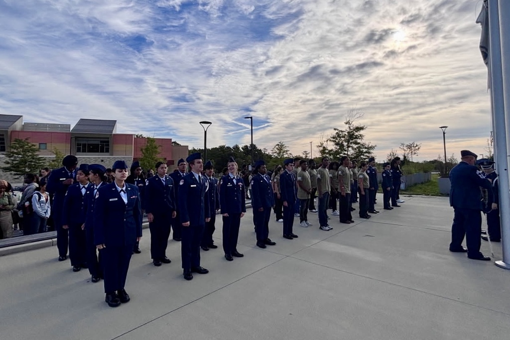 Students in JROTC stand in formation together.