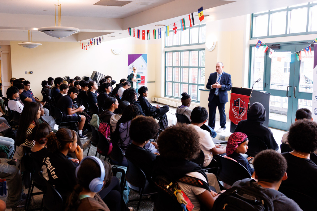 Superintendent Brian E. Allen speaks with students of Claremont Academy and University Park.