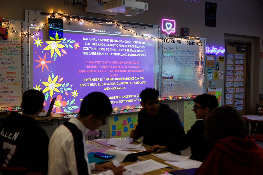 Students work together on a class lesson.