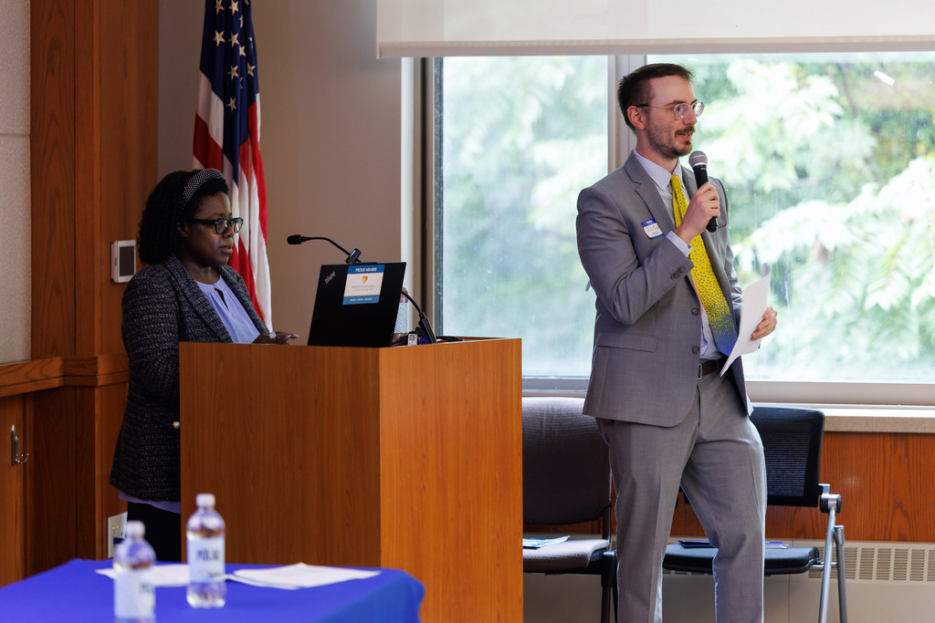 A speaker speaks during a forum.