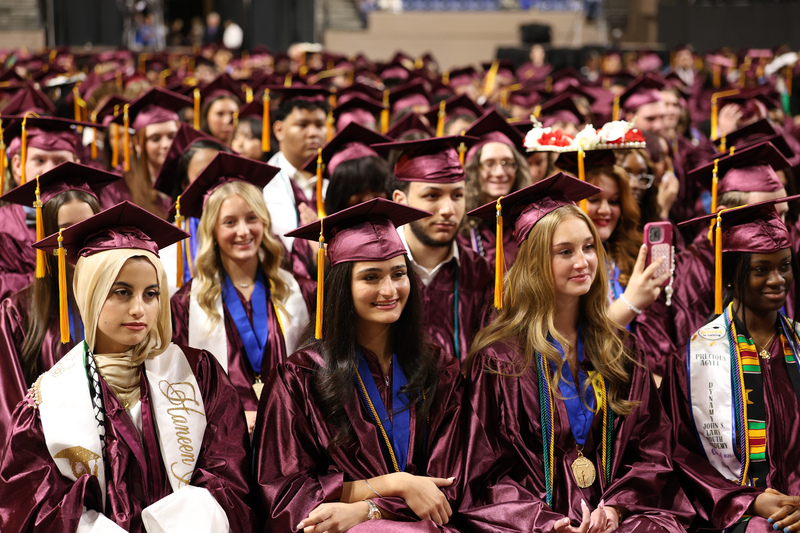 Graduates of Doherty Memorial High School seated in their chairs during graduation.