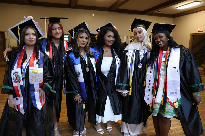 Graduates of University Park Campus School stand together for a pre-graduation photo before the school’s commencement ceremony.