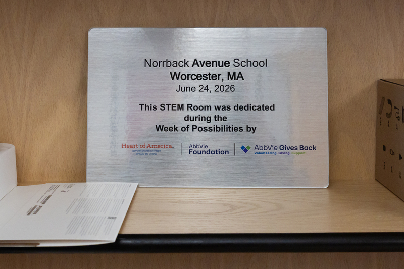 A sign that reads "Norrback Avenue School, Worcester, MA, June 24, 2026" and "The STEM Room was dedicated during the week of possibilities.
