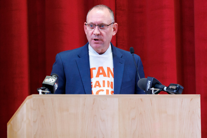 Superintendent Brian E. Allen speaks at the podium.