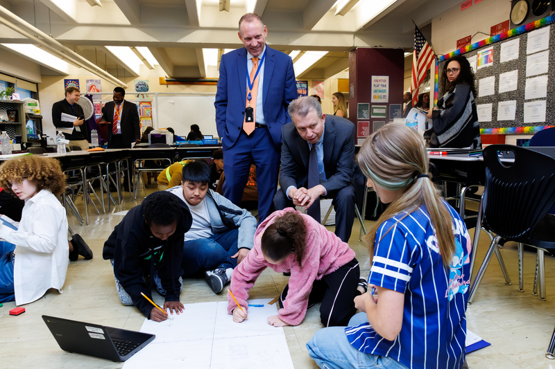 DESE Commissioner Pedro Martinez and WPS Superintendent Brian E. Allen interact with students.