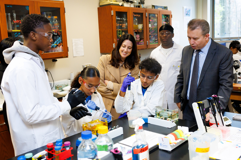 DESE Commissioner Pedro Martinez  interacts with Biotechnology students.