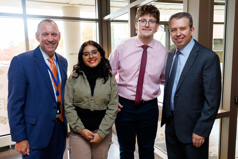 WPS Superintendent Brian E. Allen and DESE Commissioner Pedro Martinez stand with two student ambassadors from Worcester Tech.