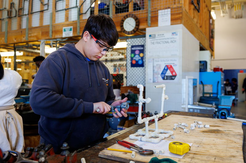 a student at a workbench