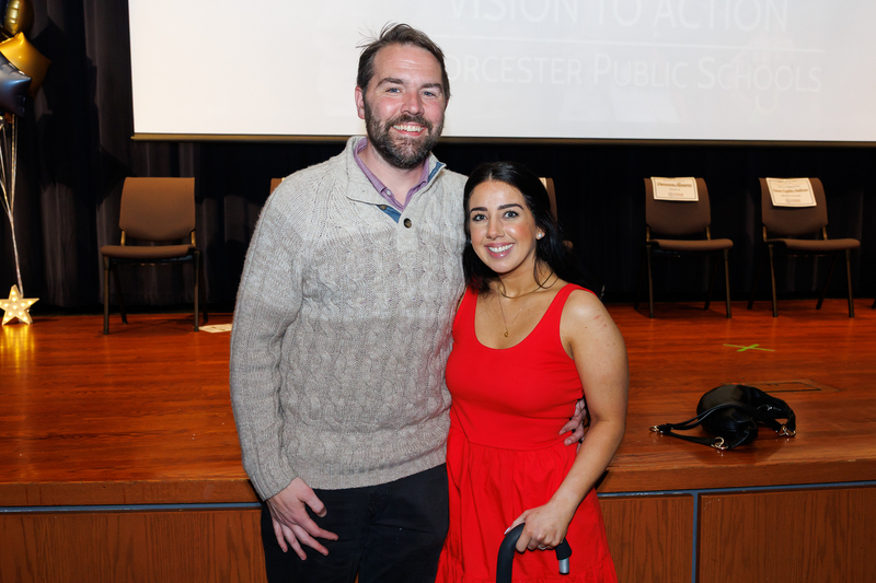 Taylor Nunez and her spouse stand together.