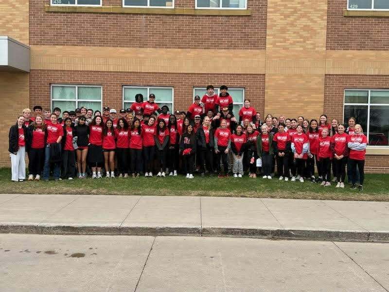 Trojan Athletes outside of the WHS standing in a group