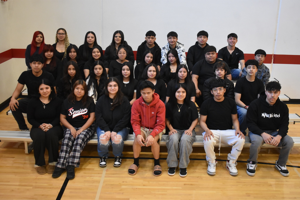 Students sitting on bleachers 