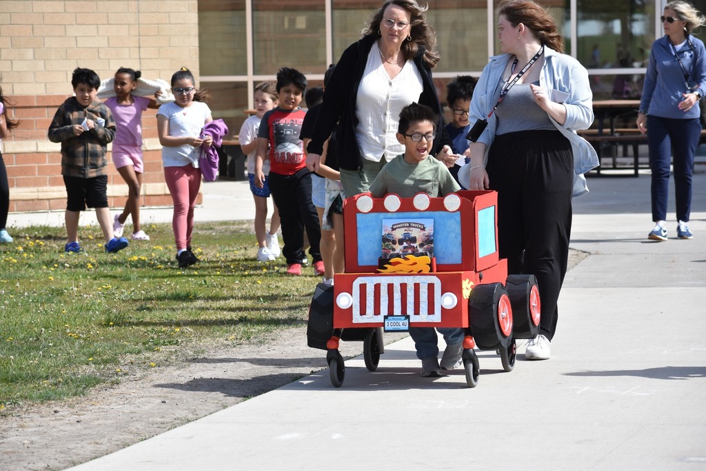 Student in a cart that can walk and push - decorated like a truck