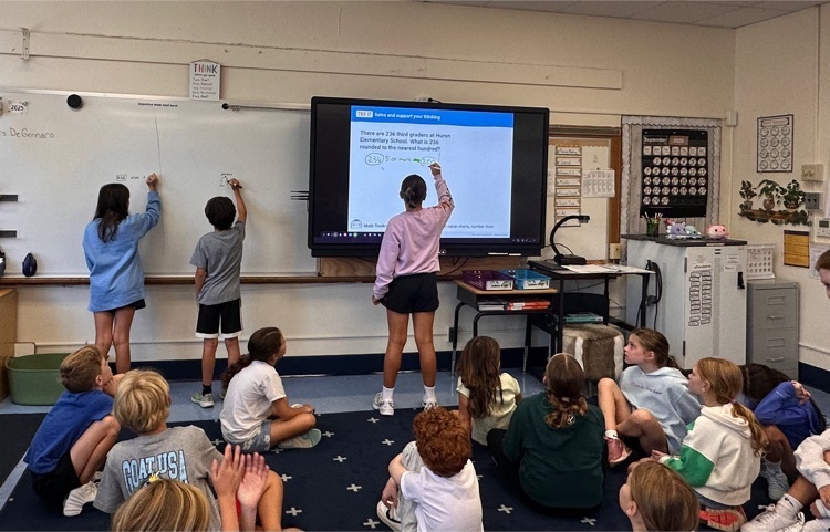 students solving math problem