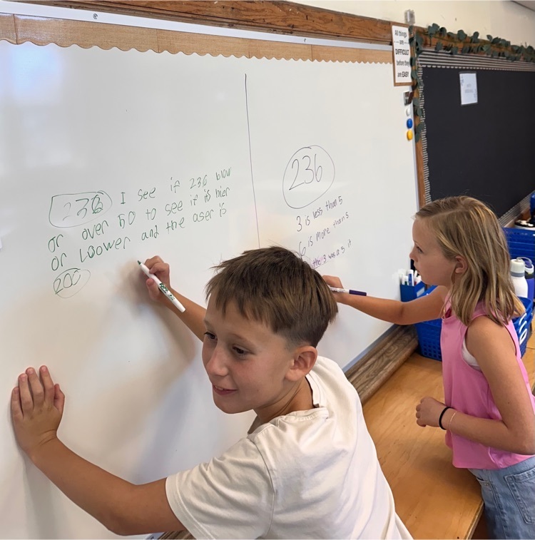students solving math problem