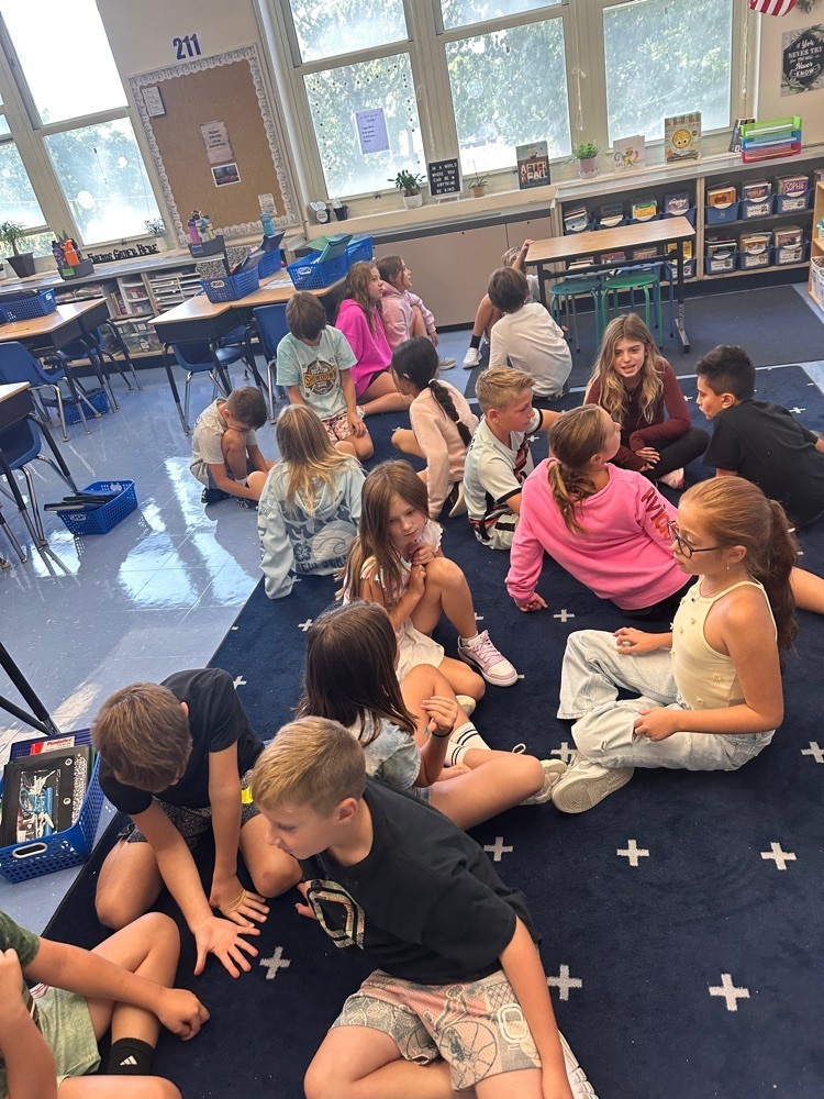 students discussing math problem