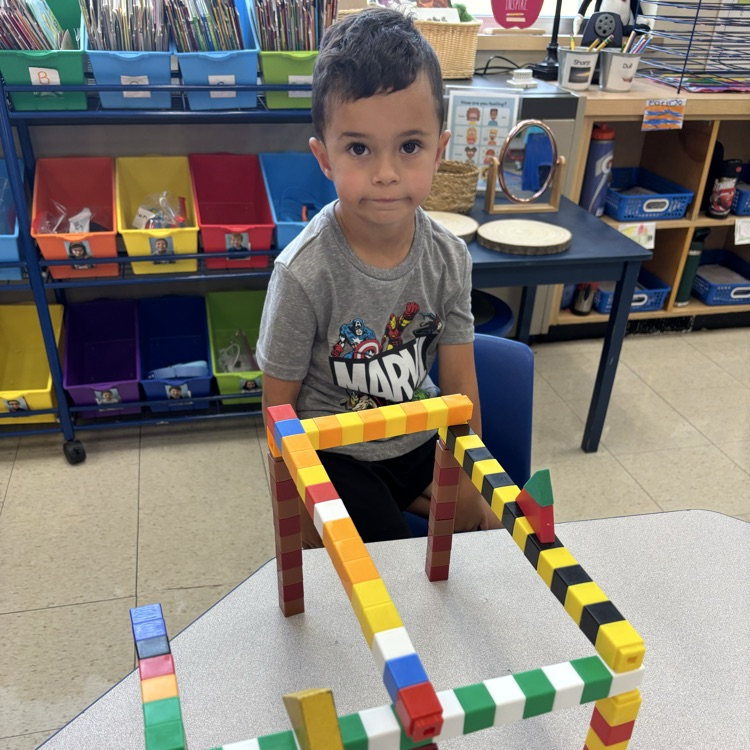Boy, using math tools