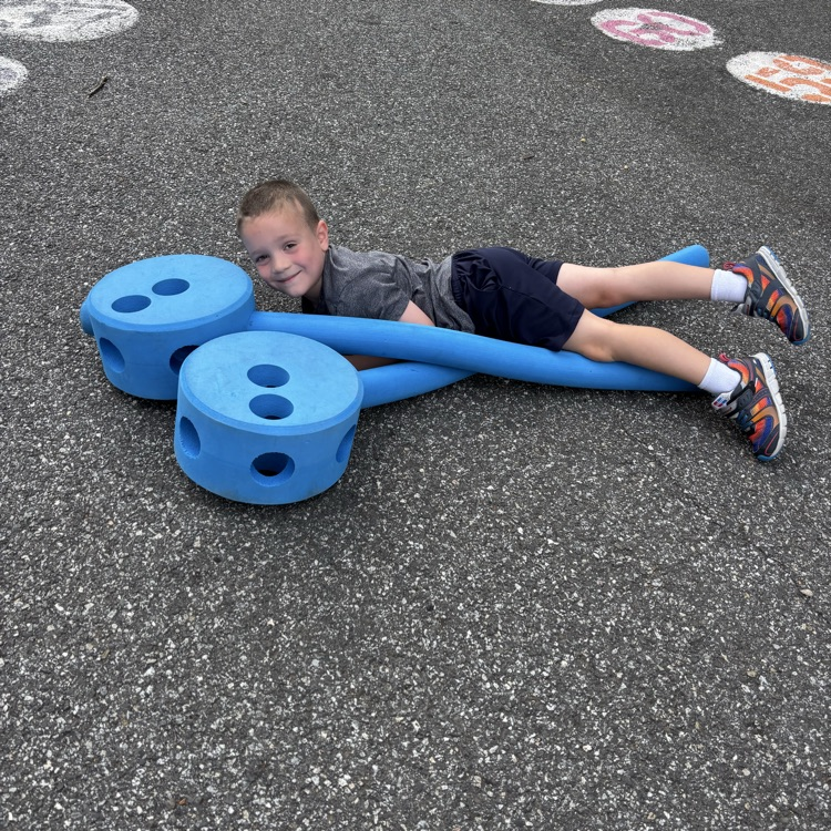 boy playing outdoor blocks