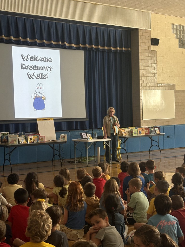 Author Rosemary Wells talking to students in the school gym