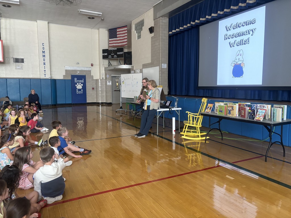 Author Rosemary Wells talking to students in the school gym