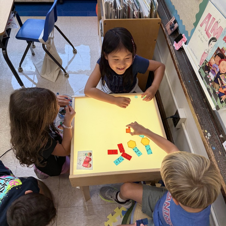 students at light table