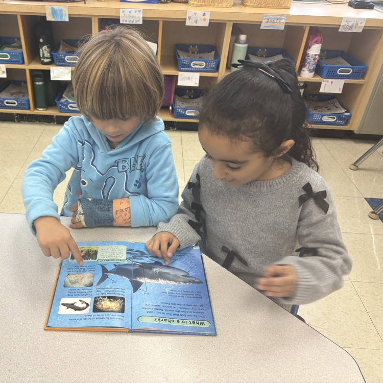 children reading together