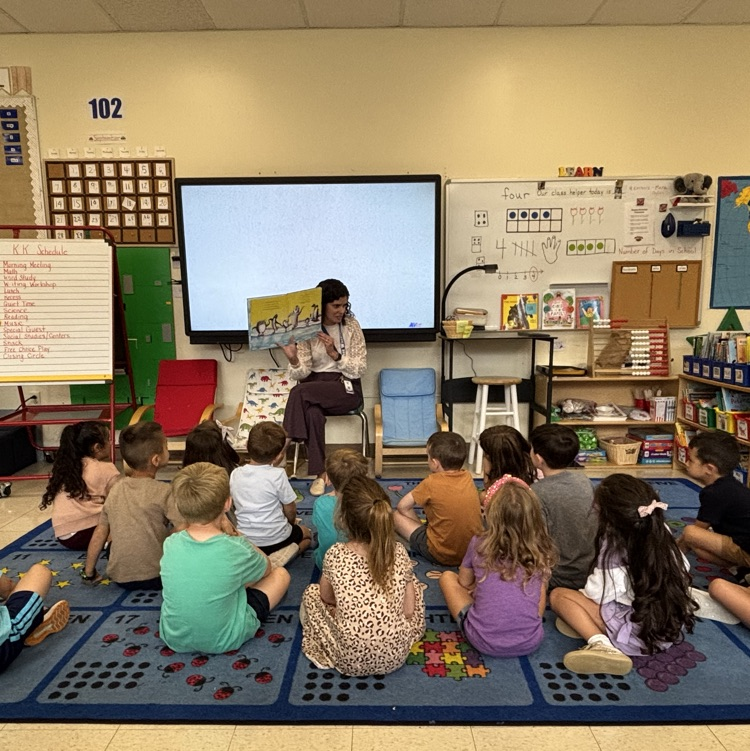 teacher reading a book
