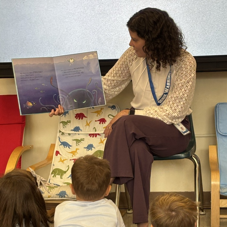 teacher reading a book