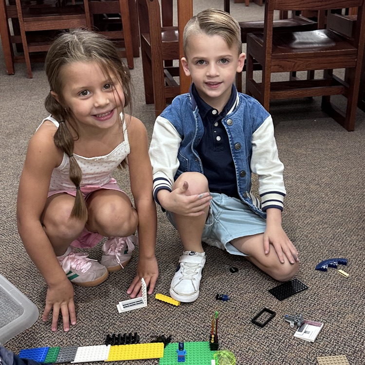 students building with Legos 