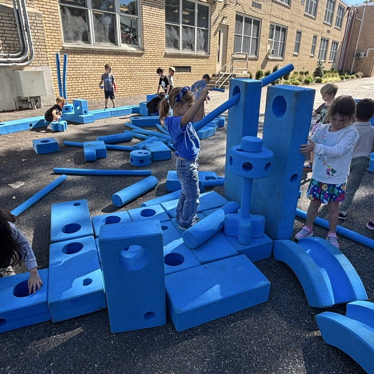 Children playing outdoor blocks